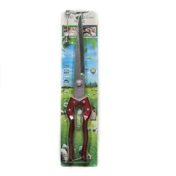 Scissors Ghannam Red Handle Long displayed in packaging with a vibrant outdoor backdrop, featuring ergonomic red handles and sharp stainless steel blades for precision cutting.