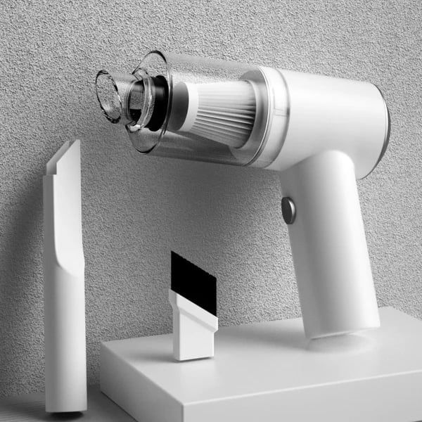 Wireless Multi-functional Vacuum Cleaner displayed against a textured wall, featuring its transparent dust container and accessories for versatile cleaning options.