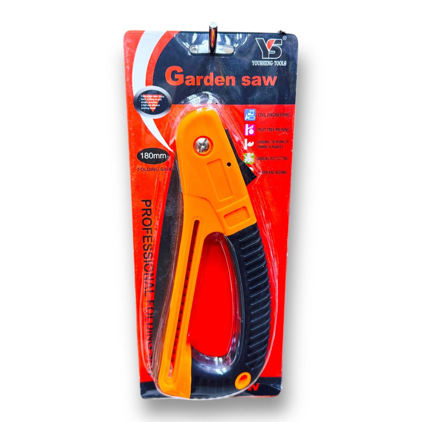 Pruning Saw Folding Orange/Black Handle MS 531374 displayed in its packaging, showcasing ergonomic design and compact foldable feature for gardening tasks.