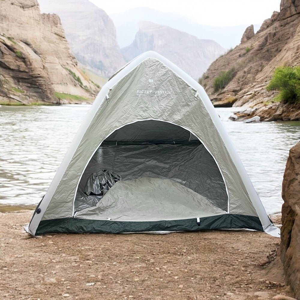 AirDome Inflatable Camping Tent set up by a river, showcasing its spacious design and weather-resistant features for outdoor enthusiasts.