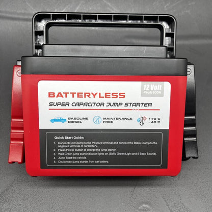 Red and black batteryless super capacitor jump starter on a gray background