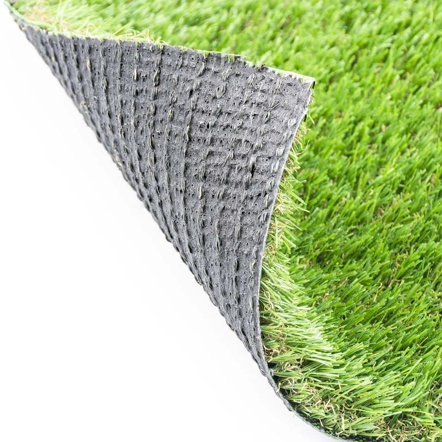 Detailed image of Artificial Grass Roll 25mm (2M x 25M) highlighting the underside texture, showcasing durability and realistic appearance for a hassle-free lawn.